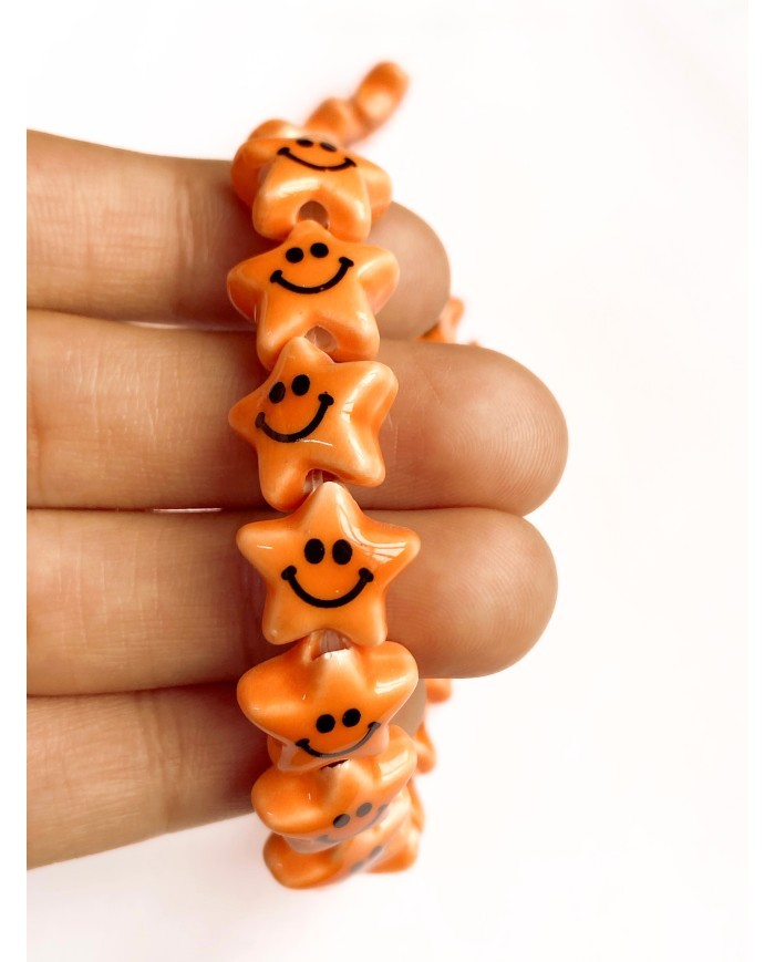 İpe Dizili Seramik Boncuk Turuncu Güleryüzlü Yıldız 12mm - 1 Dizi