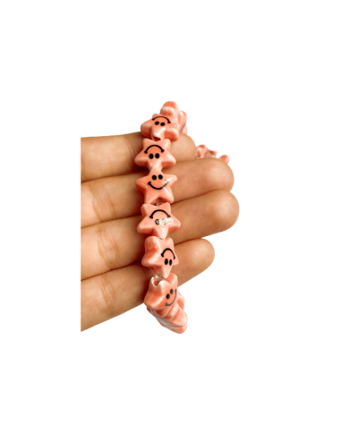 İpe Dizili Seramik Boncuk Pembe Güleryüzlü Yıldız 12mm - 1 Dizi